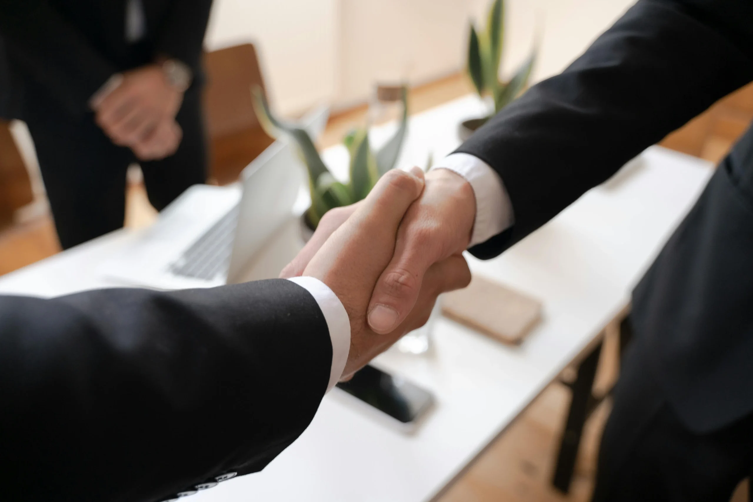 Flexible leasing and financing deal for Kraft bag printers sealed with a handshake